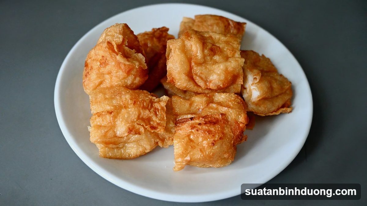 Chả mực chay chiên vàng, dai nhẹ, giòn rìa – Bình Dương Catering